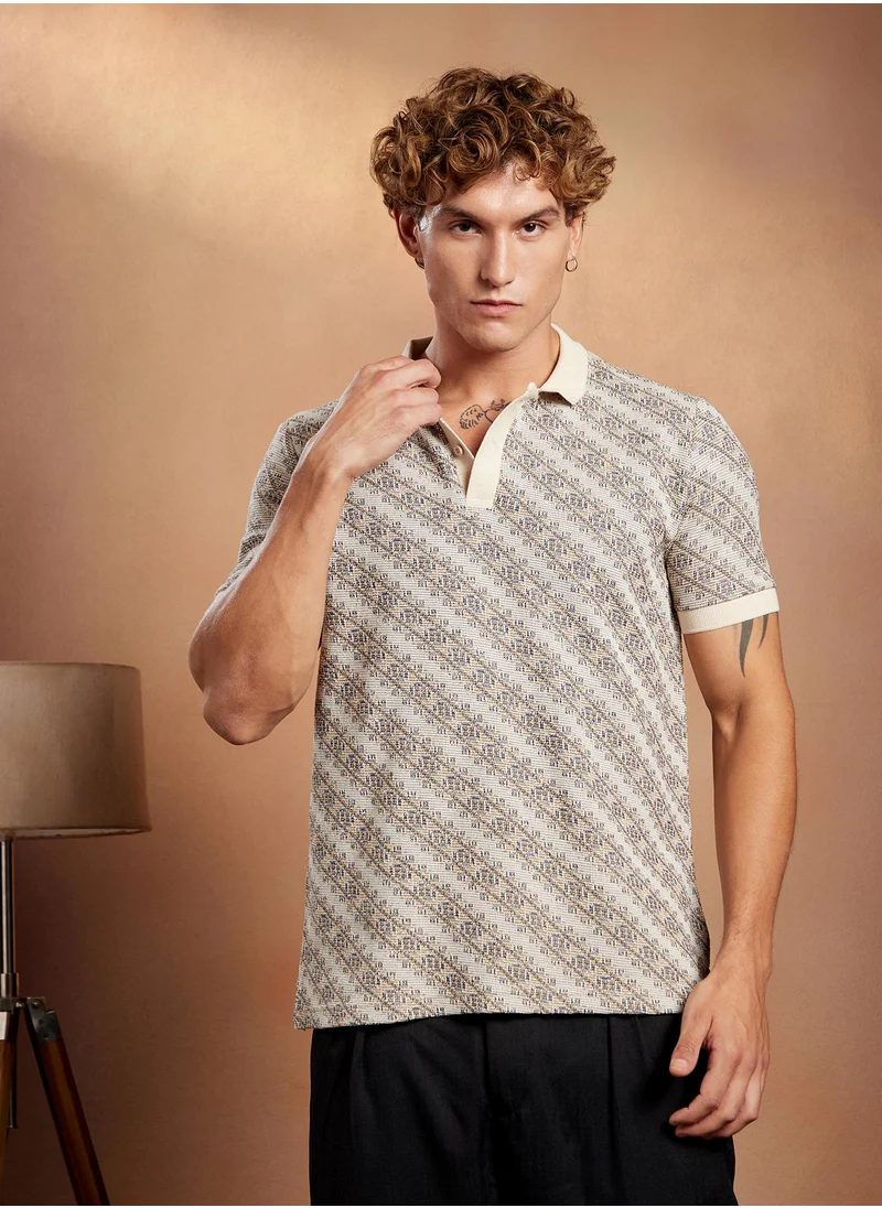 Campus Sutra Campus Sutra Men's Off-White Flora-Slant Polo T-Shirt For Casual Wear | Polo Neck | Short Cuffed Sleeves | Half-Button Closure | T-Shirt Crafted With Comfort Fit For Everyday Wear