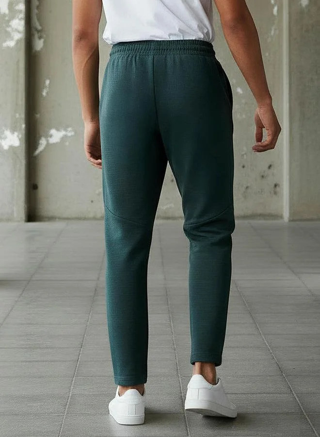 Kappa GREEN Kappa Men Panelled Track Pants for Men | Best Price UAE