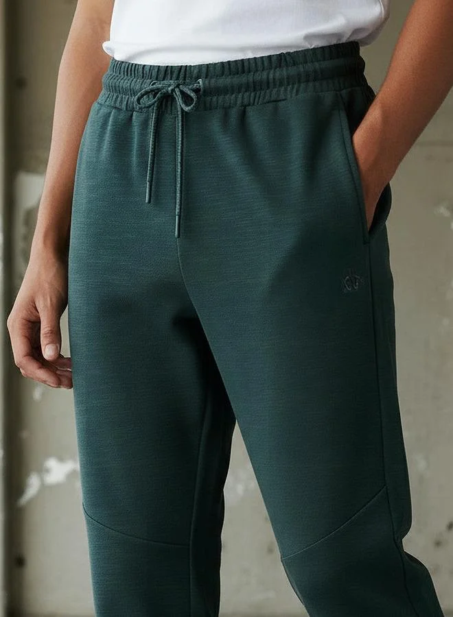 Kappa GREEN Kappa Men Panelled Track Pants for Men | Best Price UAE