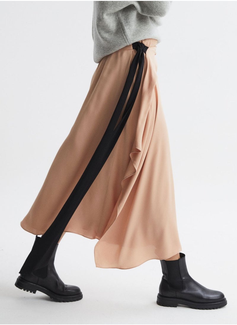 ريس تنورة مزينة برباط  - Image 1