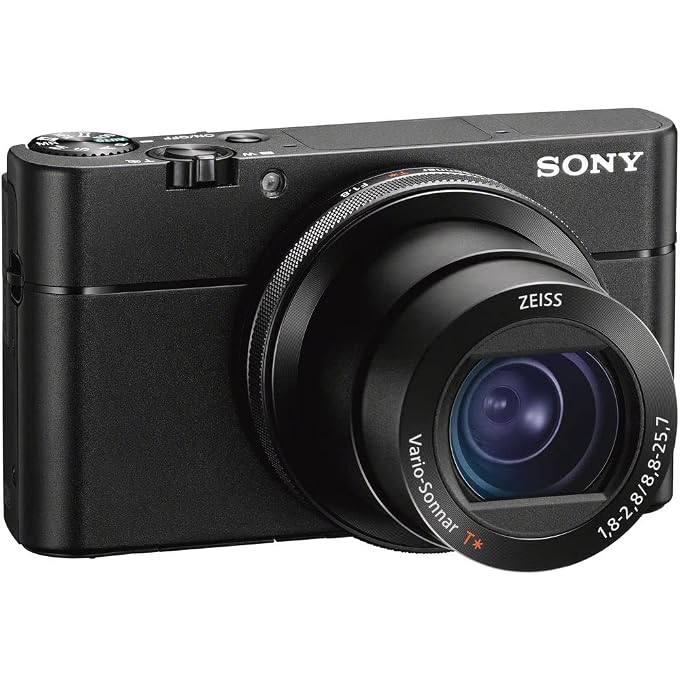 سوني كاميرا سايبرشوت DSC-RX100 VA الرقمية المدمجة الممتازة (DSC-RX100M5A/B) + حقيبة + بطاقة ذاكرة 64 جيجابايت + قارئ بطاقات + حامل ثلاثي مرن + طقم تنظيف والمزيد - Image 2
