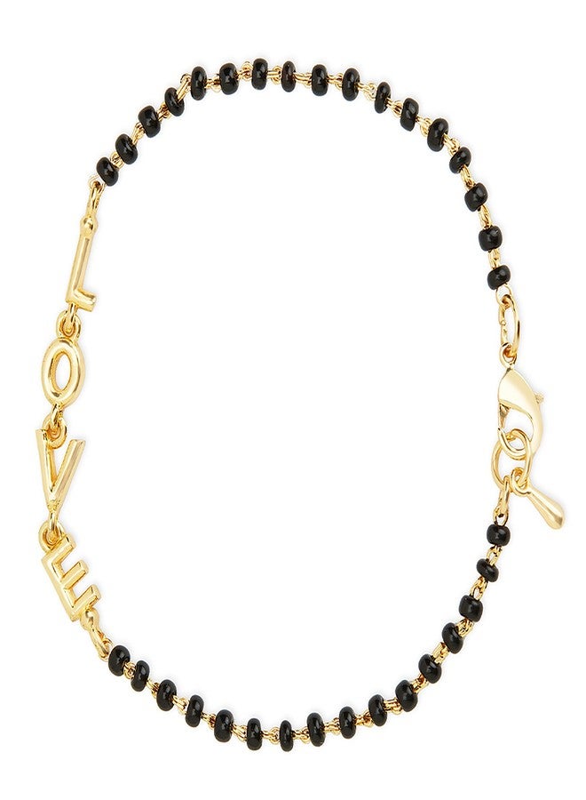 مينوتيا سوار مينوتيا الأنيق القابل للتعديل والمزين بخرز أسود على شكل رمز الحب، مصنوع من النحاس الأصفر للنساء (ذهبي) - Image 1