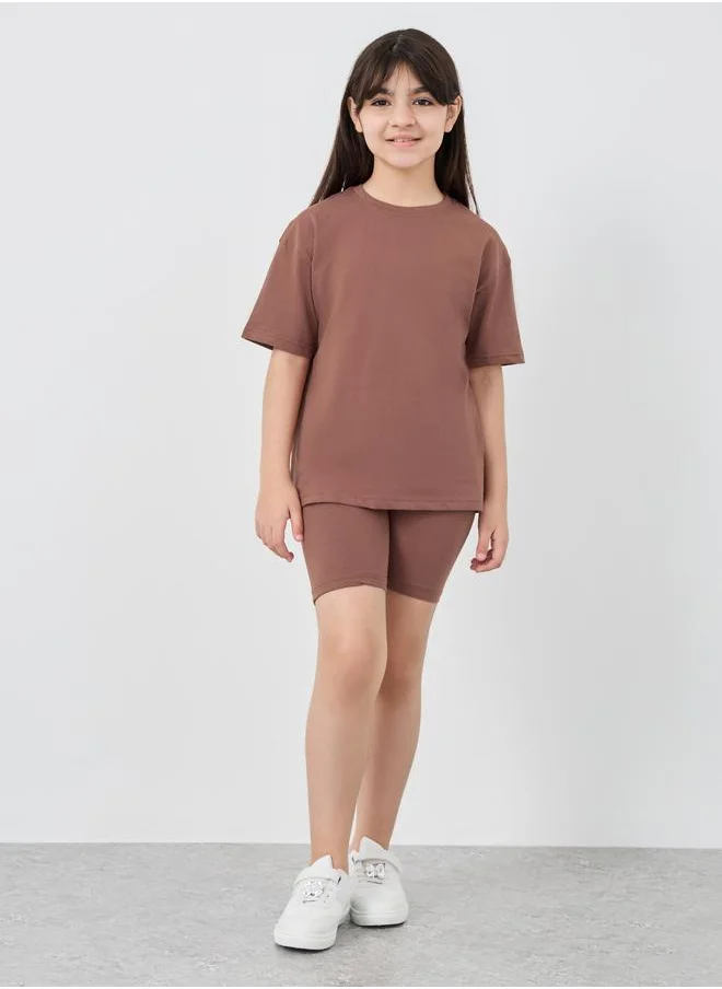 Styli Styli Solid Oversized T-Shirt with Cycle Shorts Set