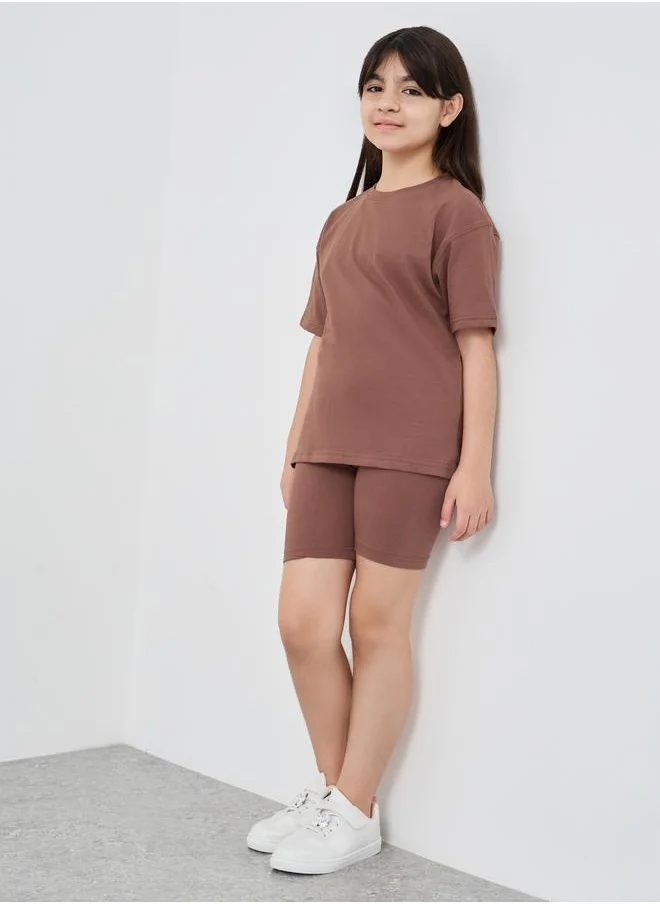 Styli Styli Solid Oversized T-Shirt with Cycle Shorts Set