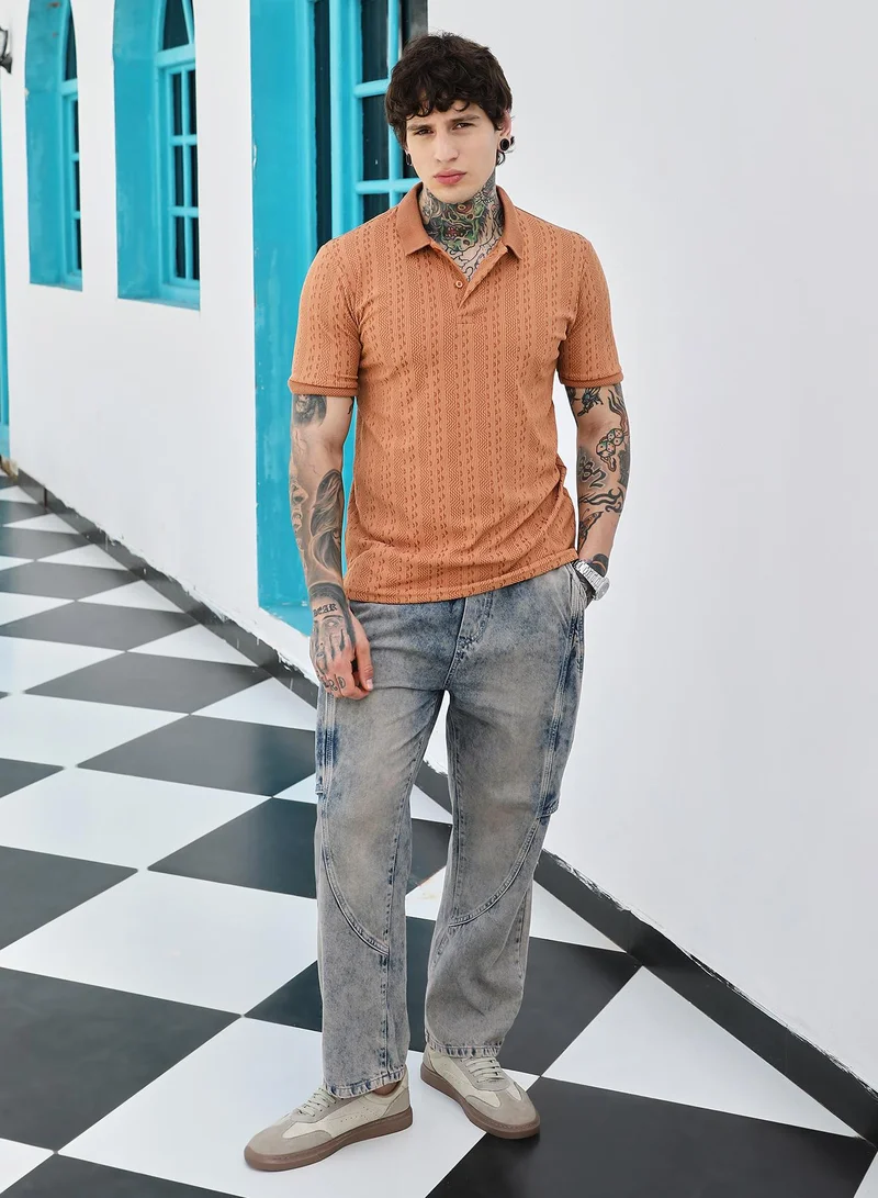 Campus Sutra Campus Sutra Men's Rust Orange Geometric-Folk Knitted Polo T-Shirt | Jacquard Polo Neck , Short Jacquard Cuff Sleeves , Button Closure , Straight Hem | Polyester Blend T-shirt For Casual Wear