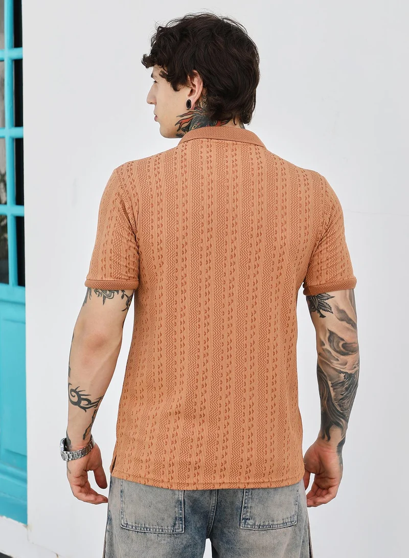 Campus Sutra Campus Sutra Men's Rust Orange Geometric-Folk Knitted Polo T-Shirt | Jacquard Polo Neck , Short Jacquard Cuff Sleeves , Button Closure , Straight Hem | Polyester Blend T-shirt For Casual Wear