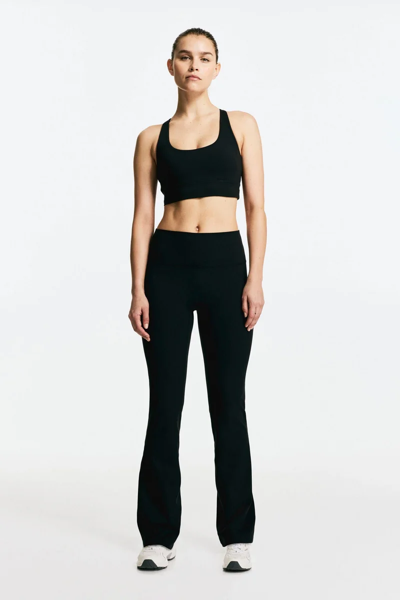 H&M Flared sports leggings in SoftMove™