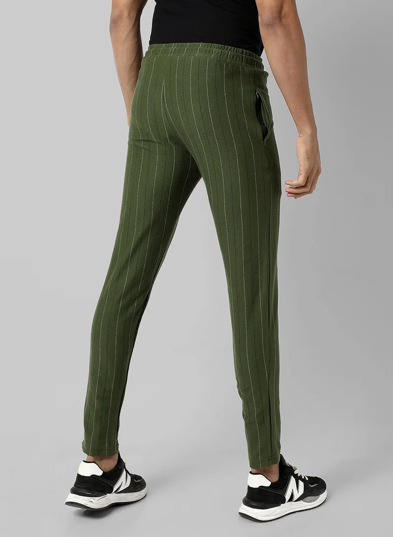 Campus Sutra Campus Sutra Men's Olive Green Striped Regular Fit Trackpants For Casual Wear | Angled Open Pockets | Elasticated Waist | Trackpants Crafted With Comfort Fit & High Performance For Everyday Wear