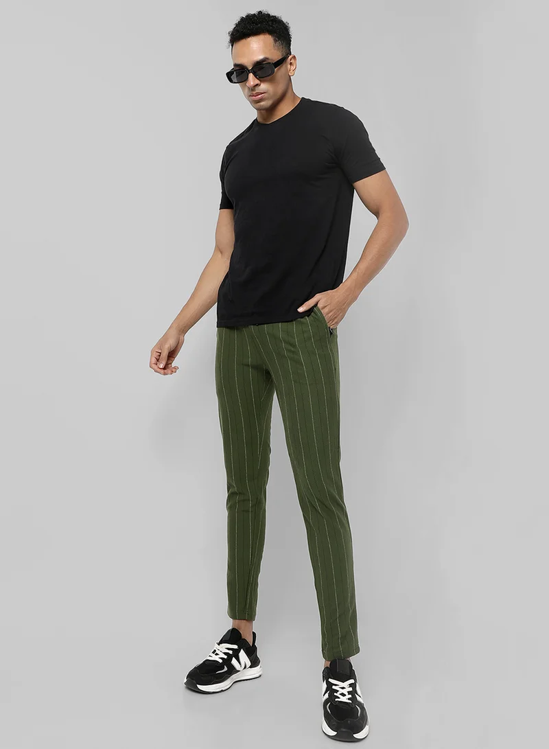 Campus Sutra Campus Sutra Men's Olive Green Striped Regular Fit Trackpants For Casual Wear | Angled Open Pockets | Elasticated Waist | Trackpants Crafted With Comfort Fit & High Performance For Everyday Wear