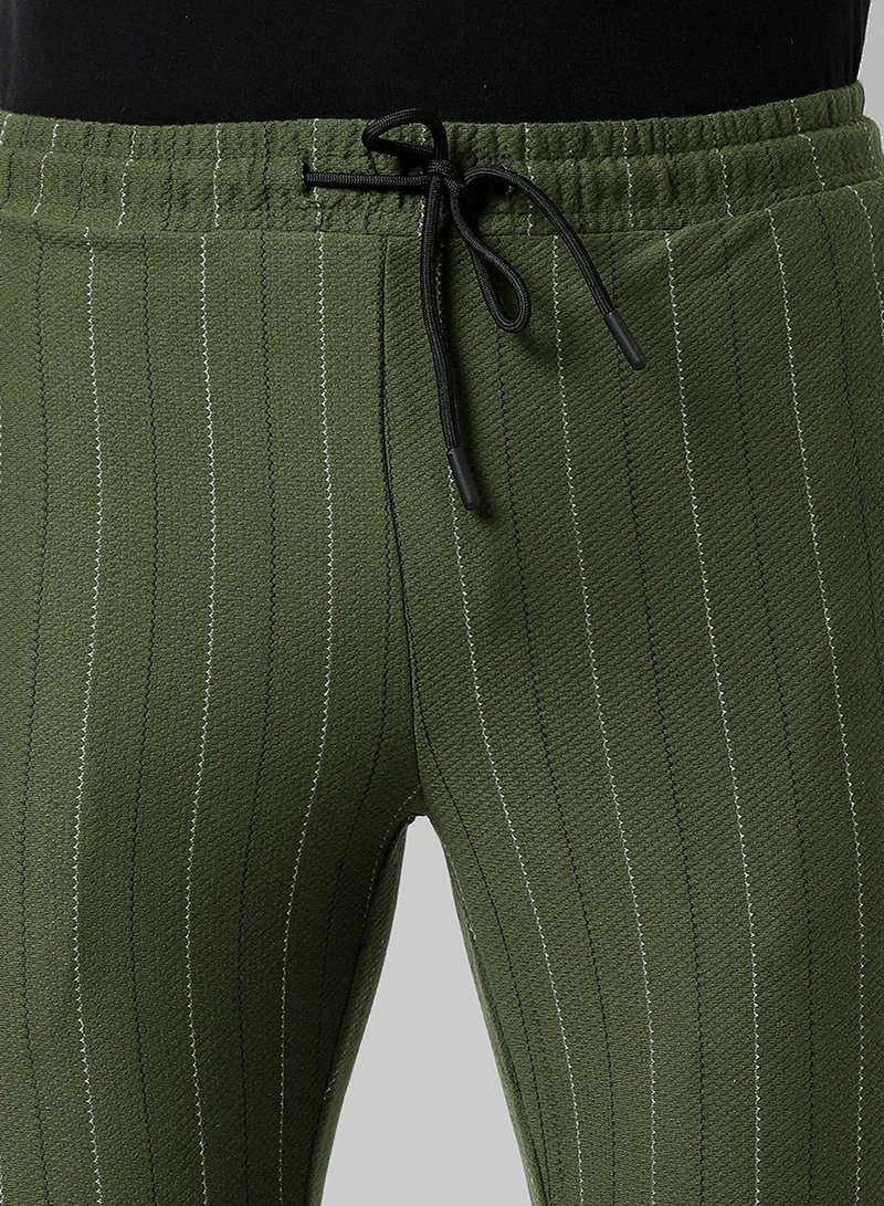 Campus Sutra Campus Sutra Men's Olive Green Striped Regular Fit Trackpants For Casual Wear | Angled Open Pockets | Elasticated Waist | Trackpants Crafted With Comfort Fit & High Performance For Everyday Wear