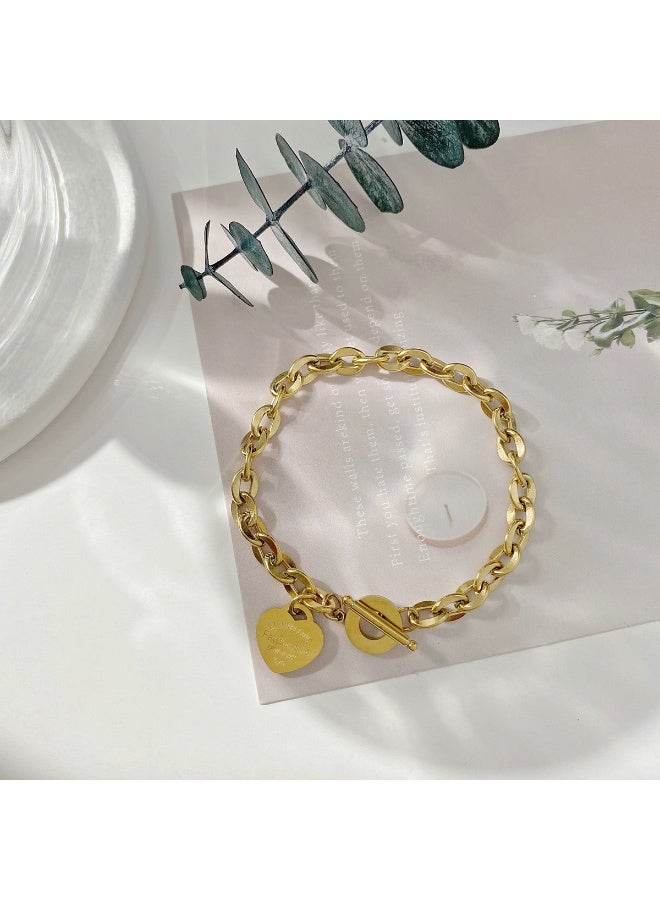 يوكانبي سوار التيتانيوم مع تصميم قلب من الفولاذ المقاوم للصدأ | تصميم عصري، سهل الاستخدام، رمز الرومانسية - Image 3