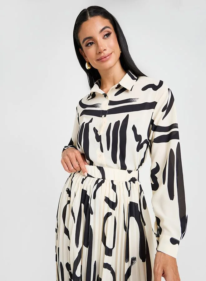 ستايلي قميص بطبعة رسومات بقصة عادية