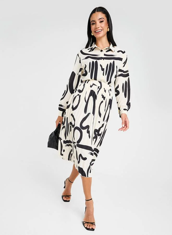 ستايلي قميص بطبعة رسومات بقصة عادية