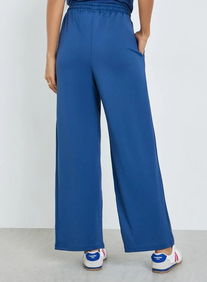 Styli Blue Styli Blue Wide Leg Joggers with Print Detail for Women | Best Price UAE