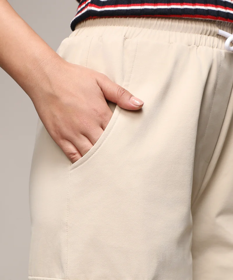 Campus Sutra Women's Beige Solid Cargo Parachute Trousers