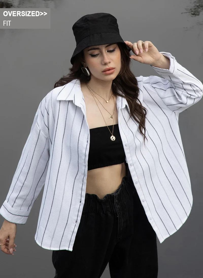 Campus Sutra Campus Sutra Women's Daisy White Woven Stripe Oversized Shirt For Casual Wear | Spread Collar | Long Sleeve | Button Closure | Oversized Shirt Crafted With Comfort Fit For Everyday Wear