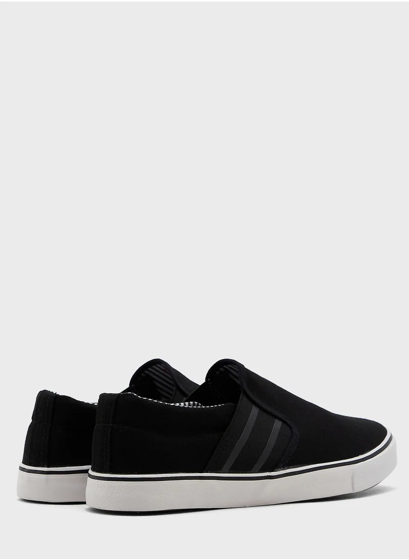 Seventy Five Canvas Slip Ons