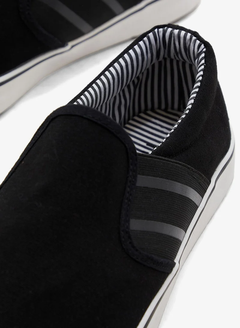 Seventy Five Canvas Slip Ons