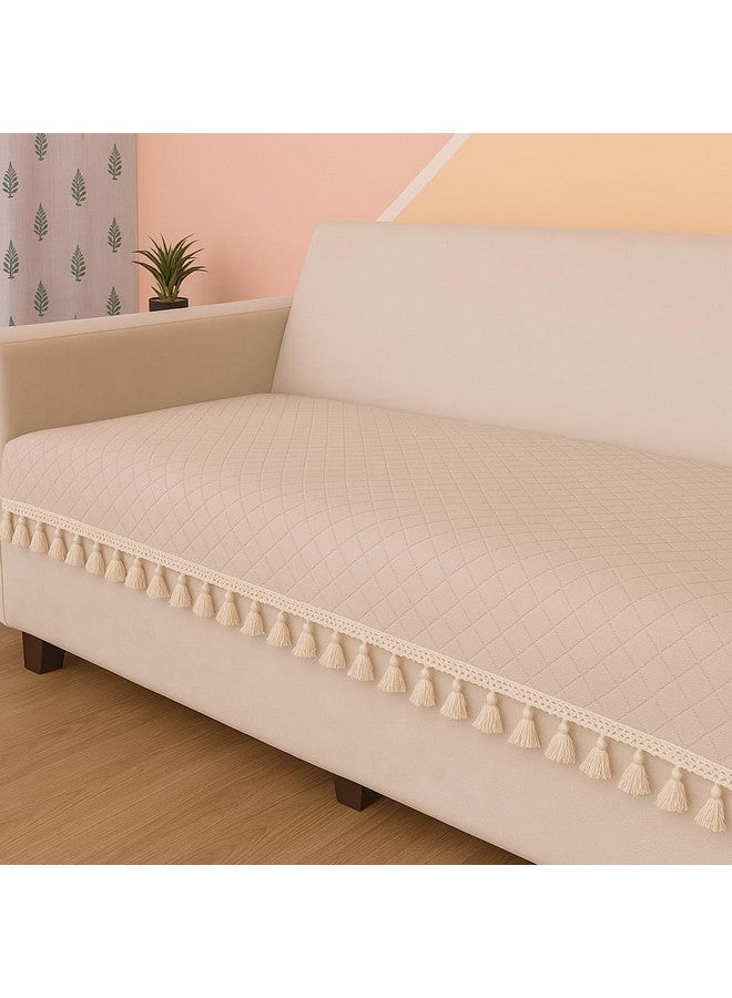 STITCHNEST 2 Seater Quilted Velvet Sofa Cover Protector with Tassel (Beige) - Image 1