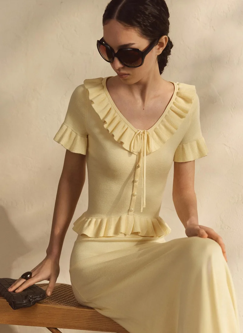 Lichi Smooth-knit cardigan with short sleeves and ruffles