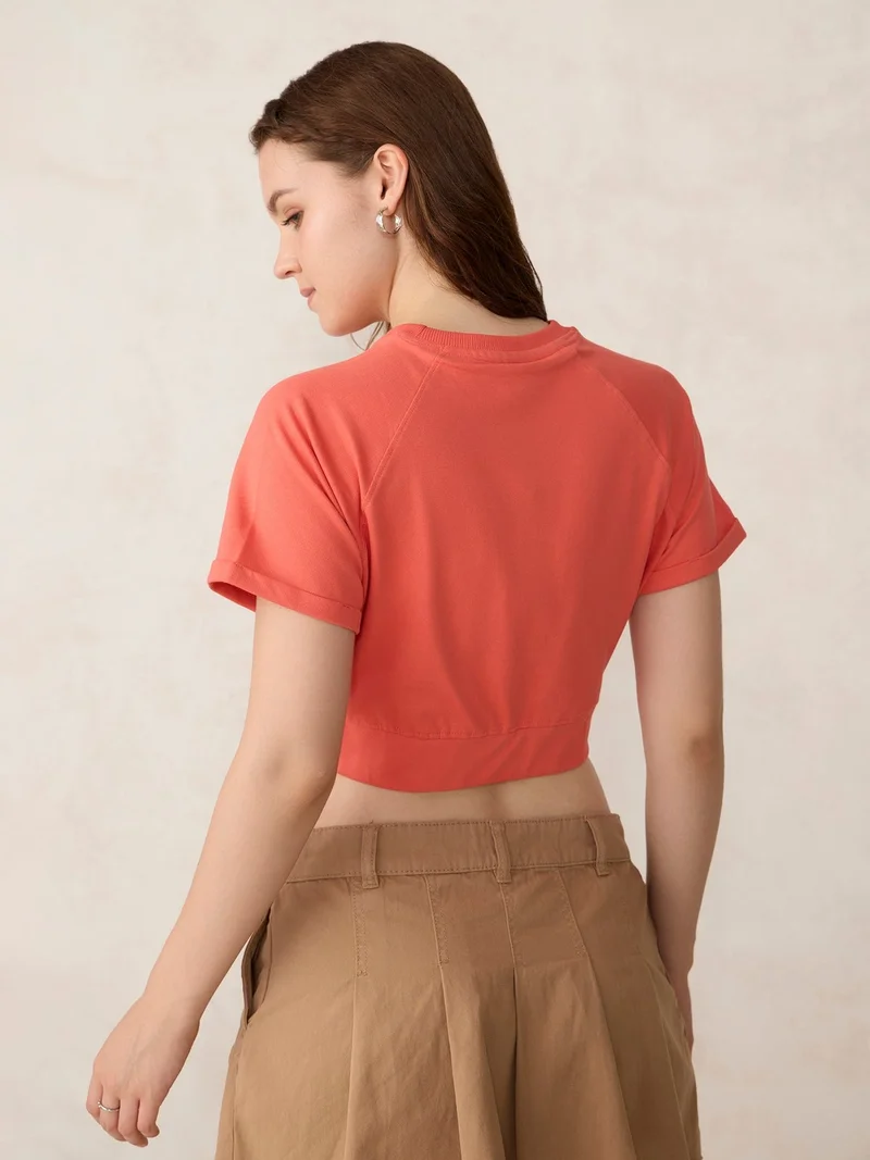 Outzidr Coral Coral Cropped Raglan Sleeve Sweatshirt for Women | Best Price UAE
