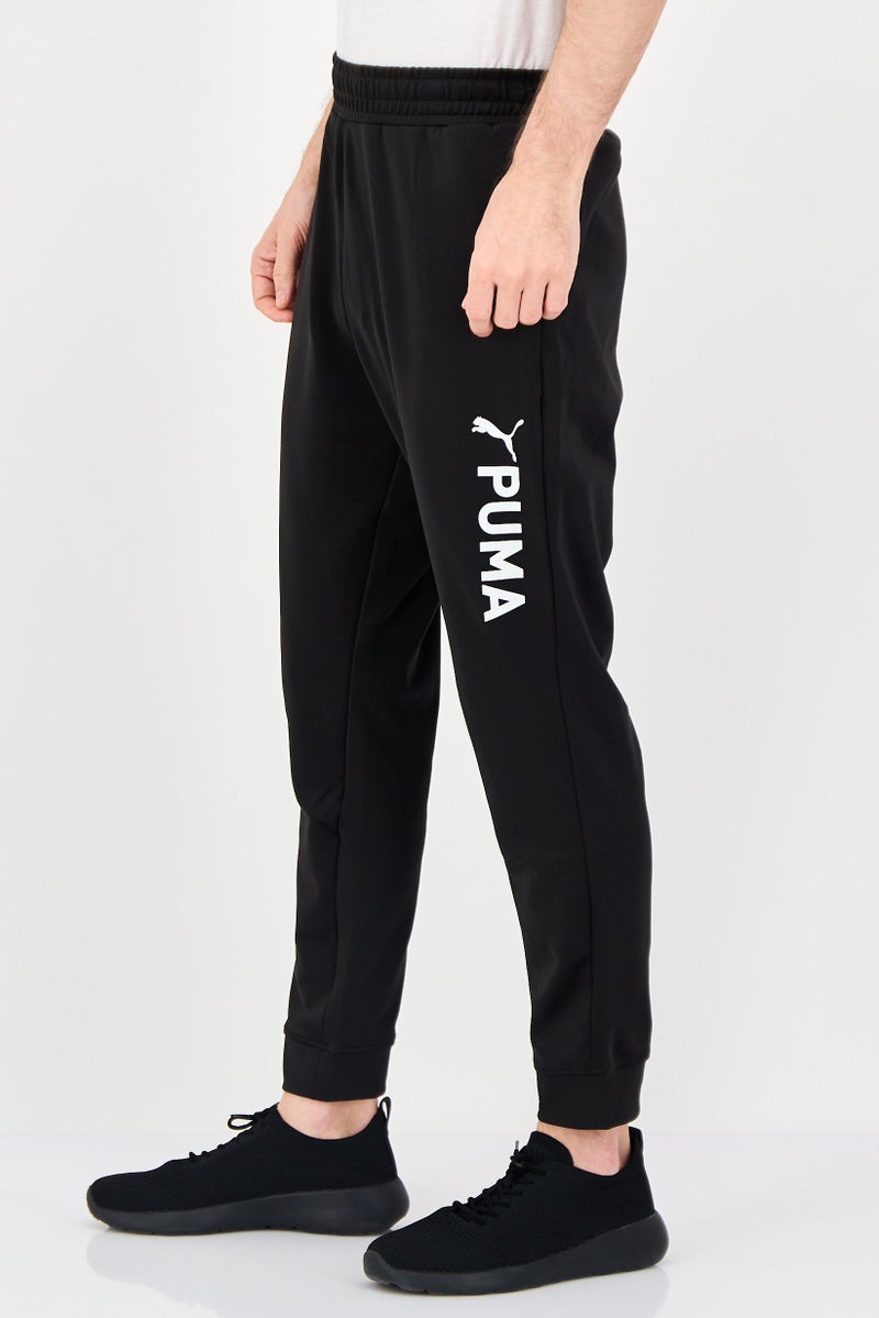 PUMA Men Sportswear Fit Brand Logo Training Track Pants, Black - Image 2