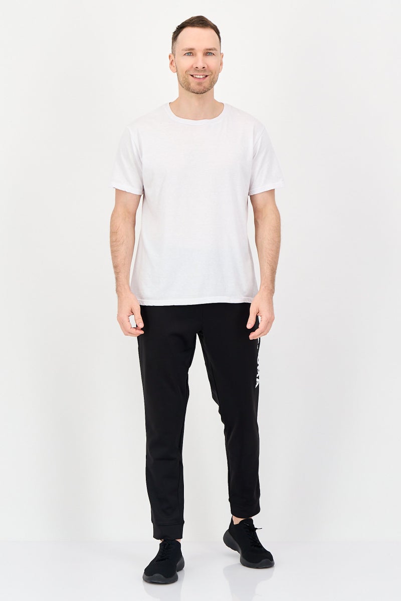 PUMA Men Sportswear Fit Brand Logo Training Track Pants, Black - Image 4