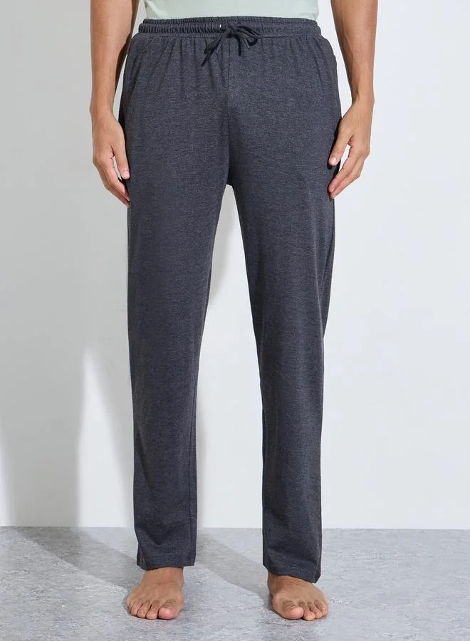 Styli  Multi-Color Solid Relaxed Fit T-Shirt and Straight Leg Pants Pyjama Set for Men | Best Price UAE