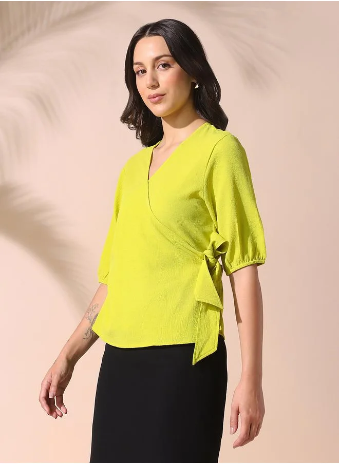 Dennis Lingo Women apple green regular fit solid half sleeves t-shirt polyester blend top with wrap closure- perfect for making bold moves.