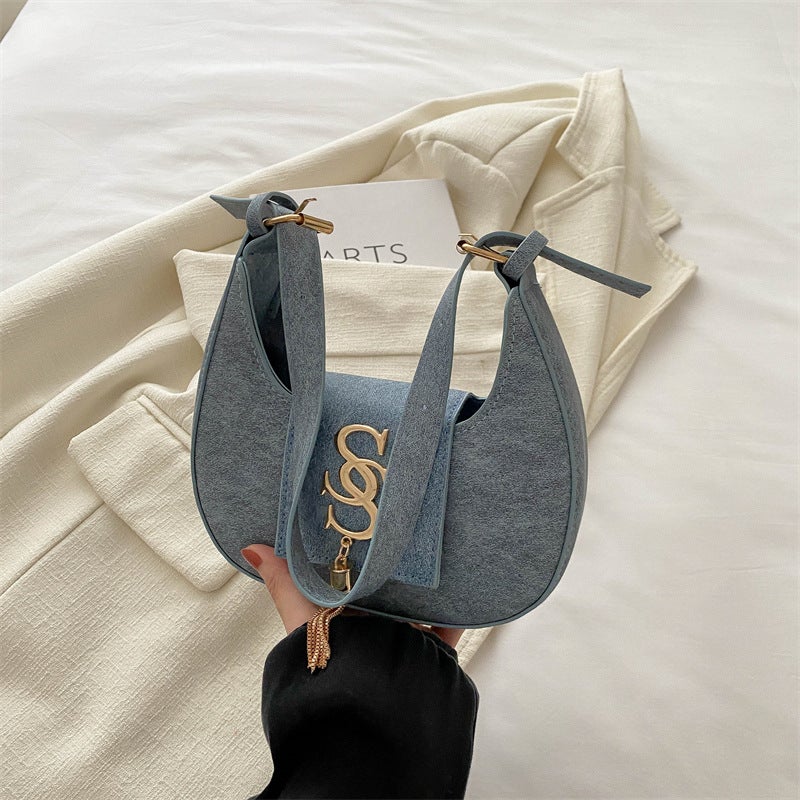 Vintage Washed Faux Suede Crescent Crossbody Bag Flip Cover With Metal Letter Logo & Tassel Pendant Adjustable Detachable Shoulder Strap Small Capacity Casual Handbag For Daily Shopping Weekend Gatherings Short Travel Street Style & Elegant Everyday Outfits - Image 1