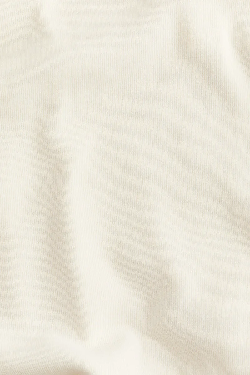 اتش اند ام كنزة فضفاضة بحافة سفلية منحنية