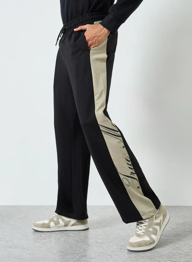 Men Black Joggers with Side Stripe Detail