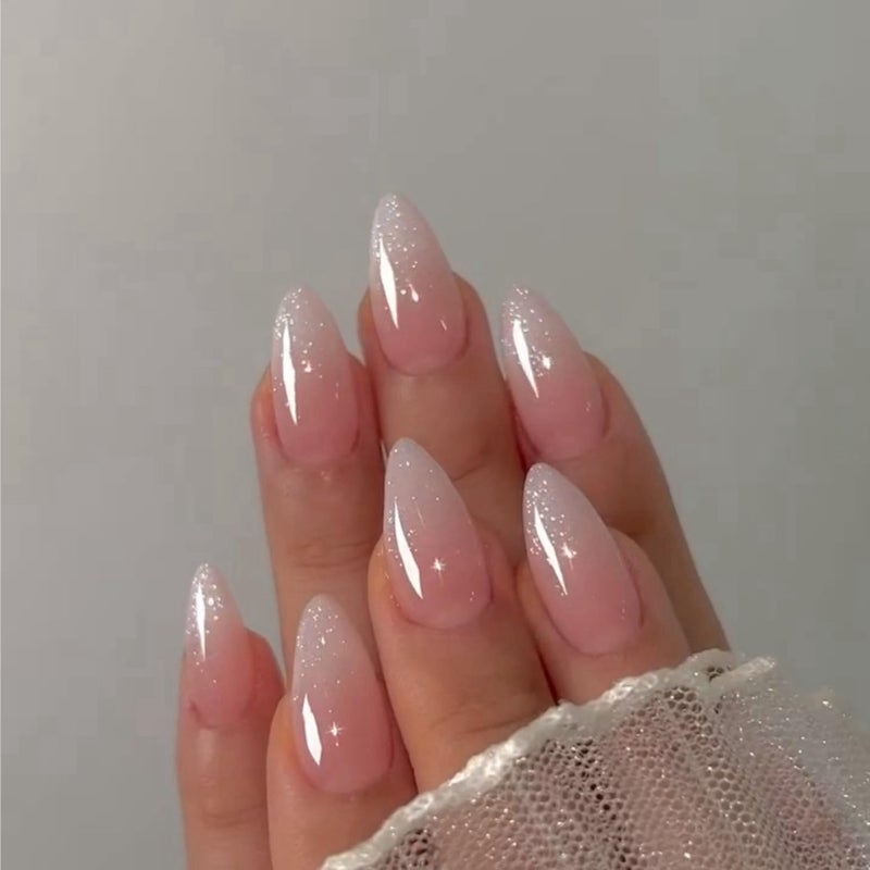 XCREANDO Glitter Ombre Pink Press on Nails Almond Shaped Nails Press ons, Medium Fake Nails Almond French Acrylic Nails Glue on Nail with Cute Design Thick Natural Stiletto False Nail for Women Wedding 24 Pcs - Image 1
