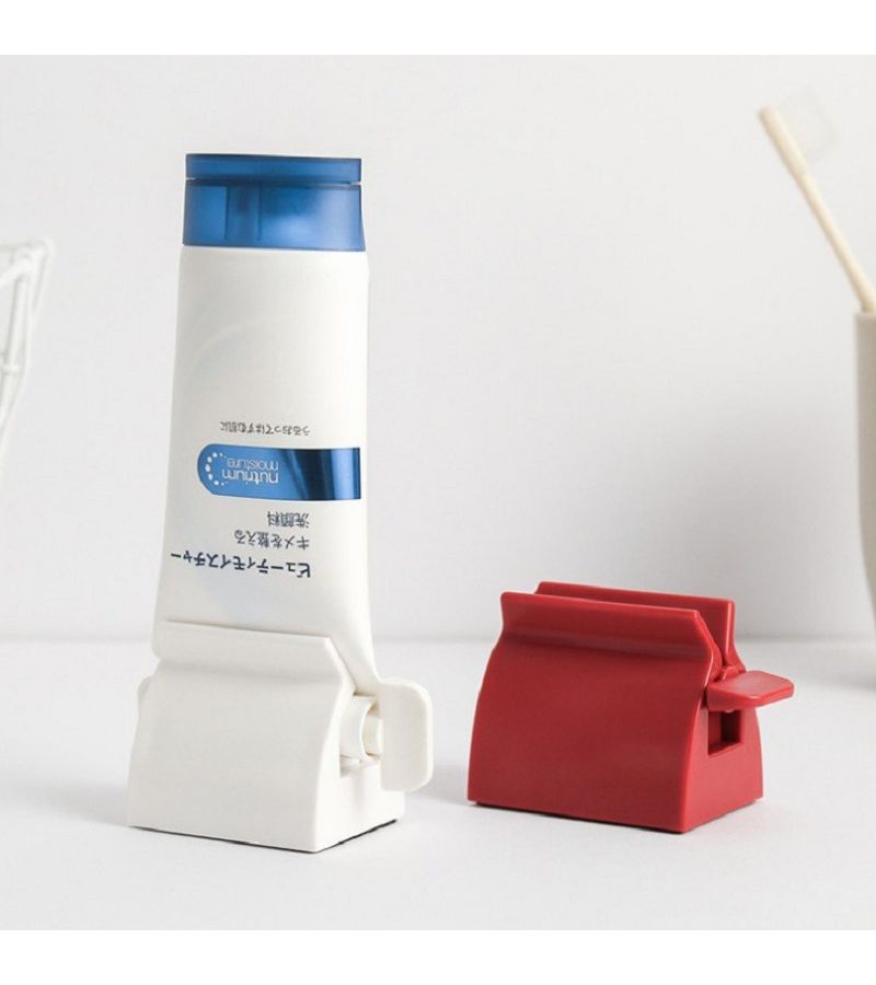 Red Manual Toothpaste Squeezer Minimizes Waste No Electricity Needed - Image 1
