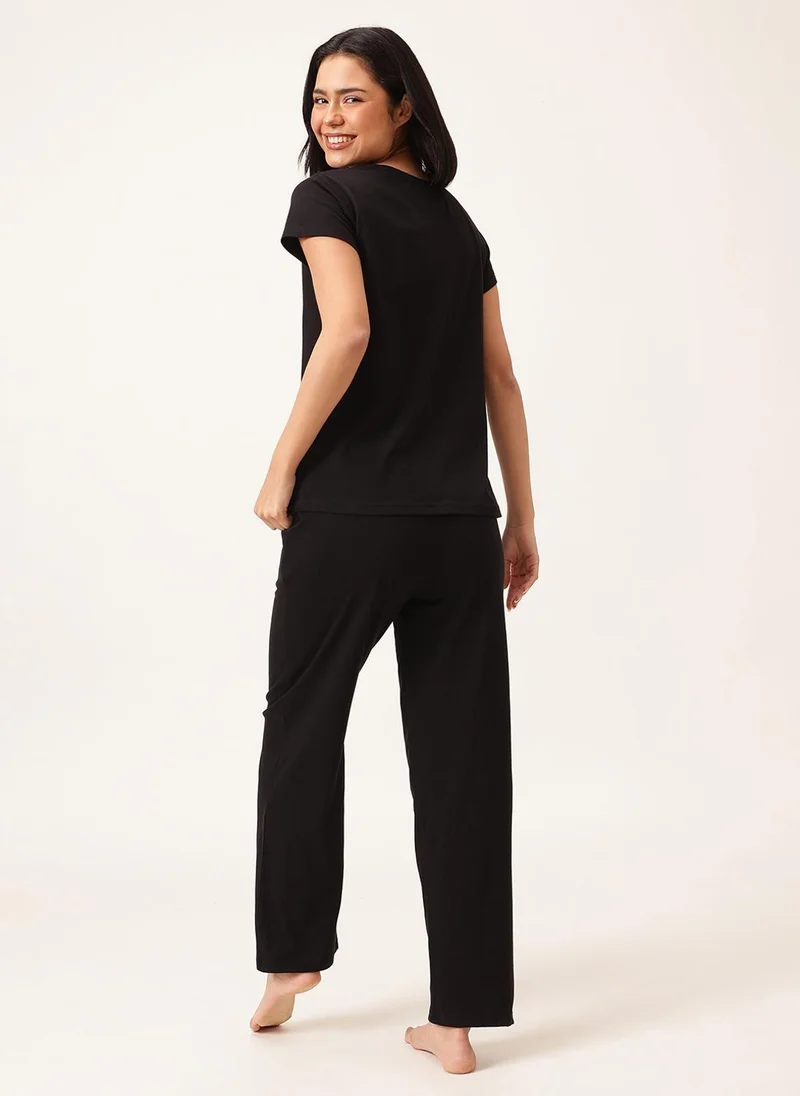 Clovia Clovia Graphic & Text Print T-shirt & Pyjama Set in Black - 100% Cotton
