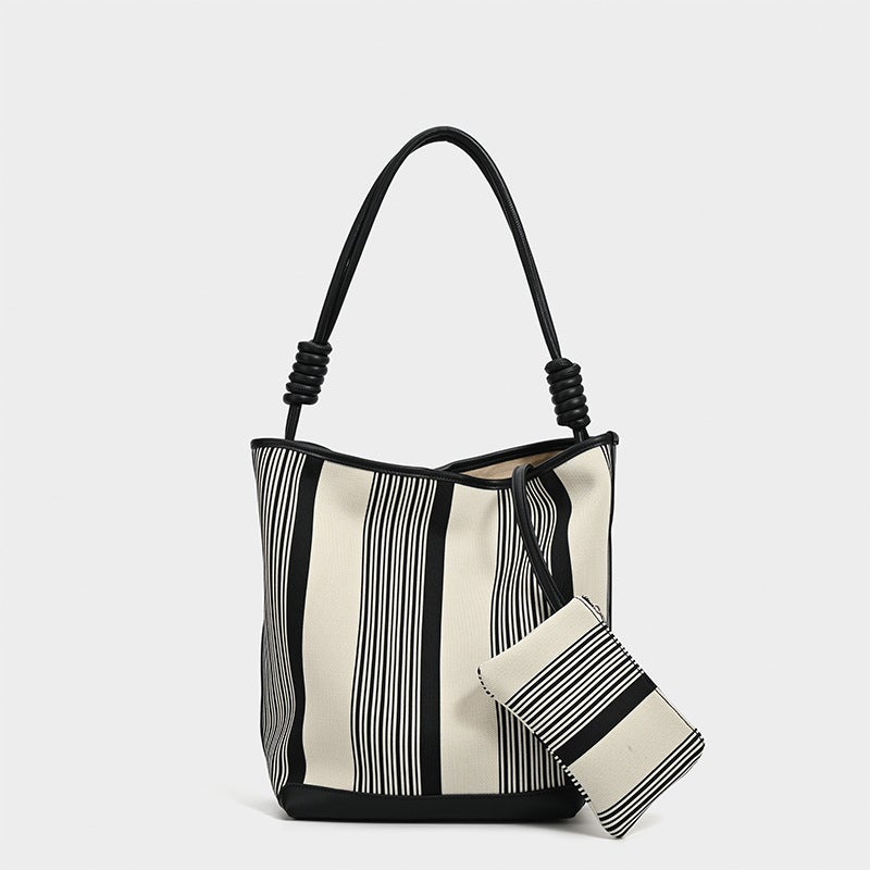 Black And White Stripe High-Grade Bucket Bag Large Capacity Stretch Woven Bag New Commuter Portable Shoulder Bag For Women - Image 1