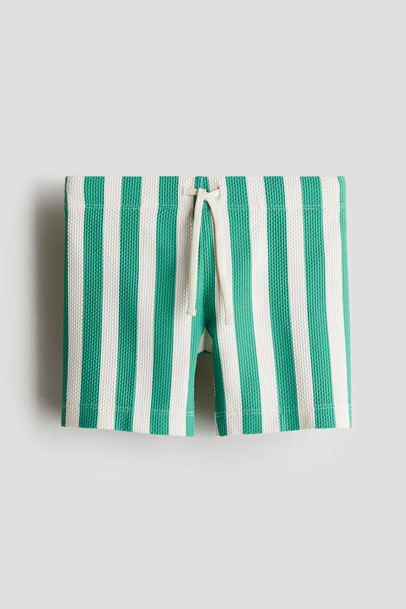 اتش اند ام شورت سباحة منقوش