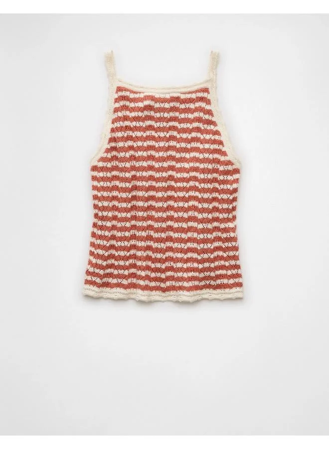 American Eagle Elevate your warm weather wardrobe with this chic tank top, crocheted for a luxe textured look.