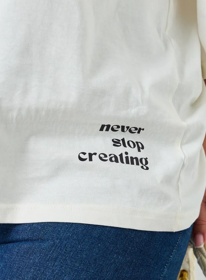 Styli Styli Plus Size Cream Slogan Print T-Shirt