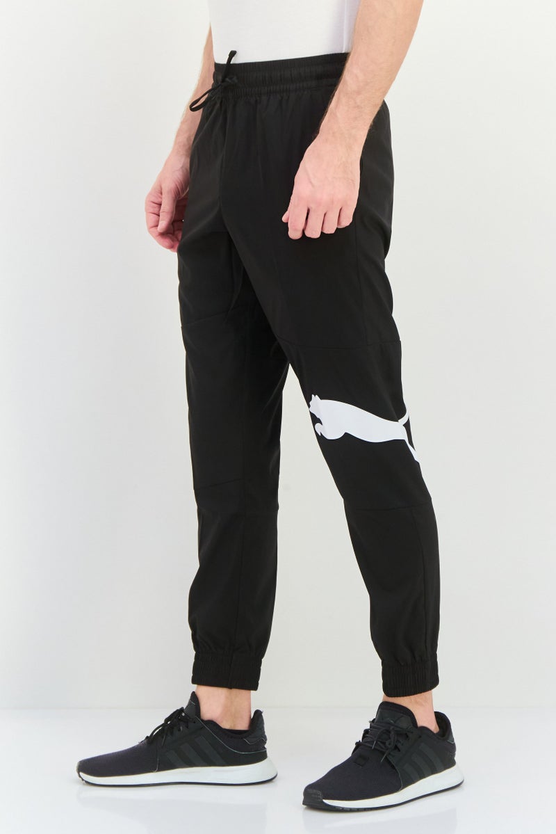 PUMA Men Sportswear Fit Outdoor Sweatpants, Black/White - Image 2