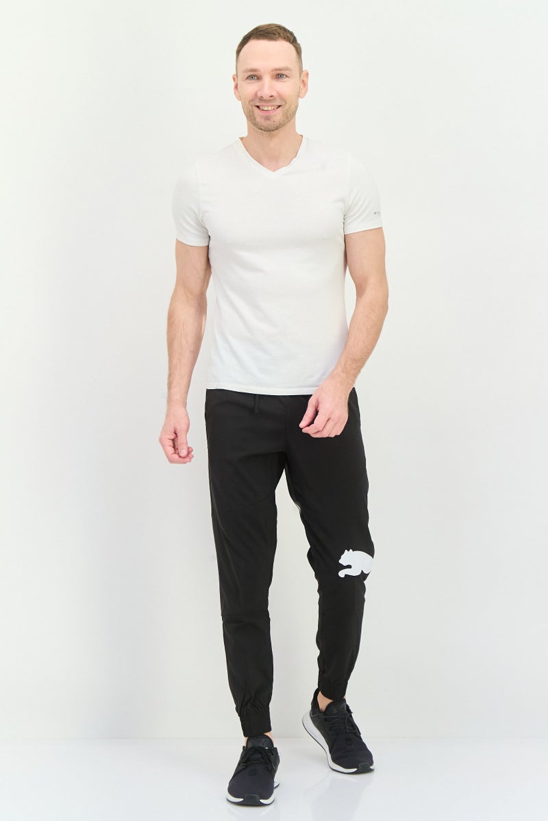 PUMA Men Sportswear Fit Outdoor Sweatpants, Black/White - Image 4