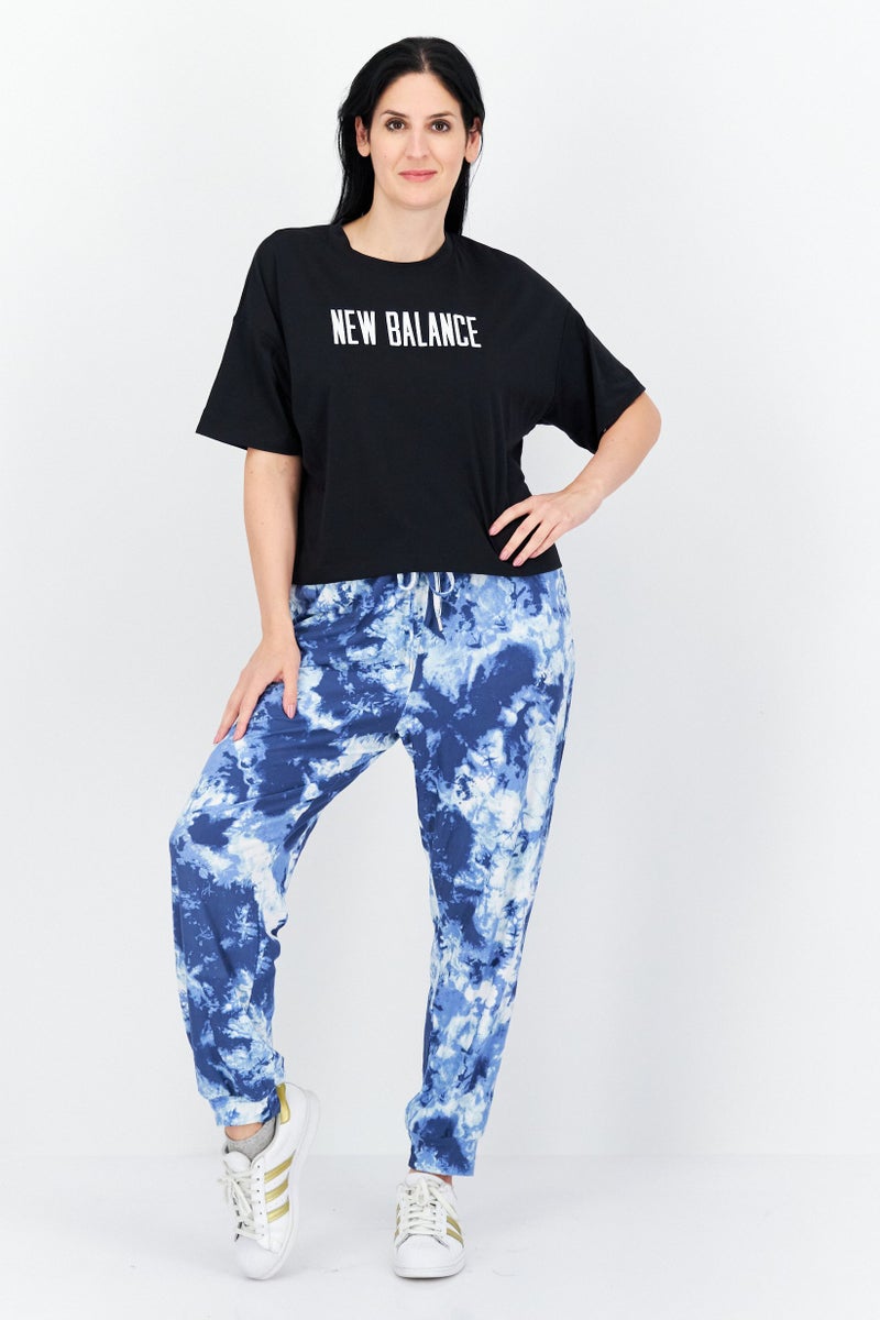 New Balance Women Sportswear Fit Short Sleeve Outdoor T-Shirt, Black - Image 4