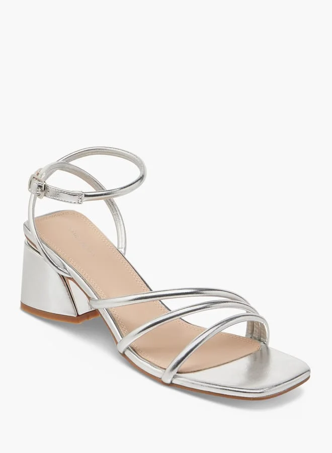 فلورا بيلا من شو إكسبرس Women Block Heeled Strap Sandals with Buckle Closure