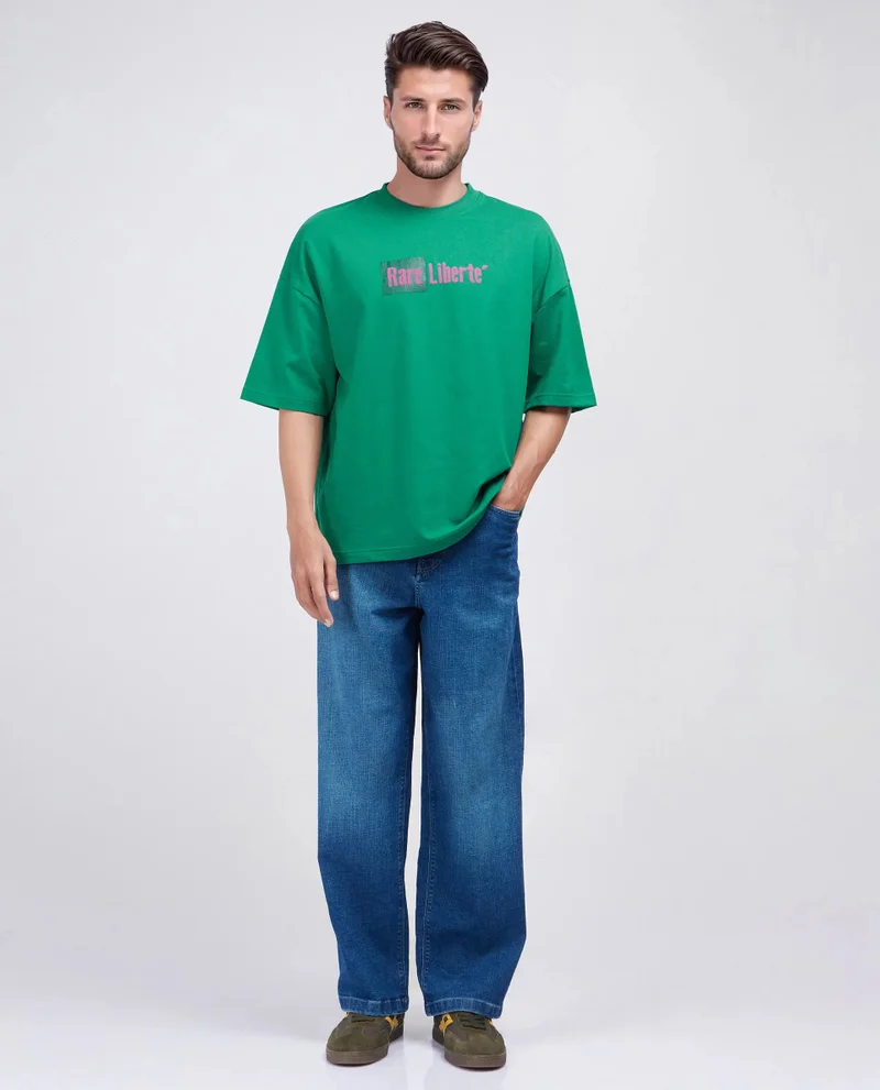 Rare Rabbit Rare Rabbit Men Moshe Green Cotton Fabric Short Sleeve Oversized Fit Graphic Printed T-Shirt