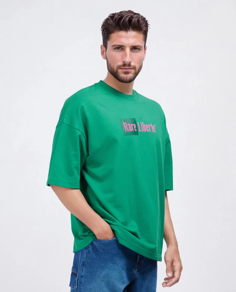 Rare Rabbit Rare Rabbit Men Moshe Green Cotton Fabric Short Sleeve Oversized Fit Graphic Printed T-Shirt