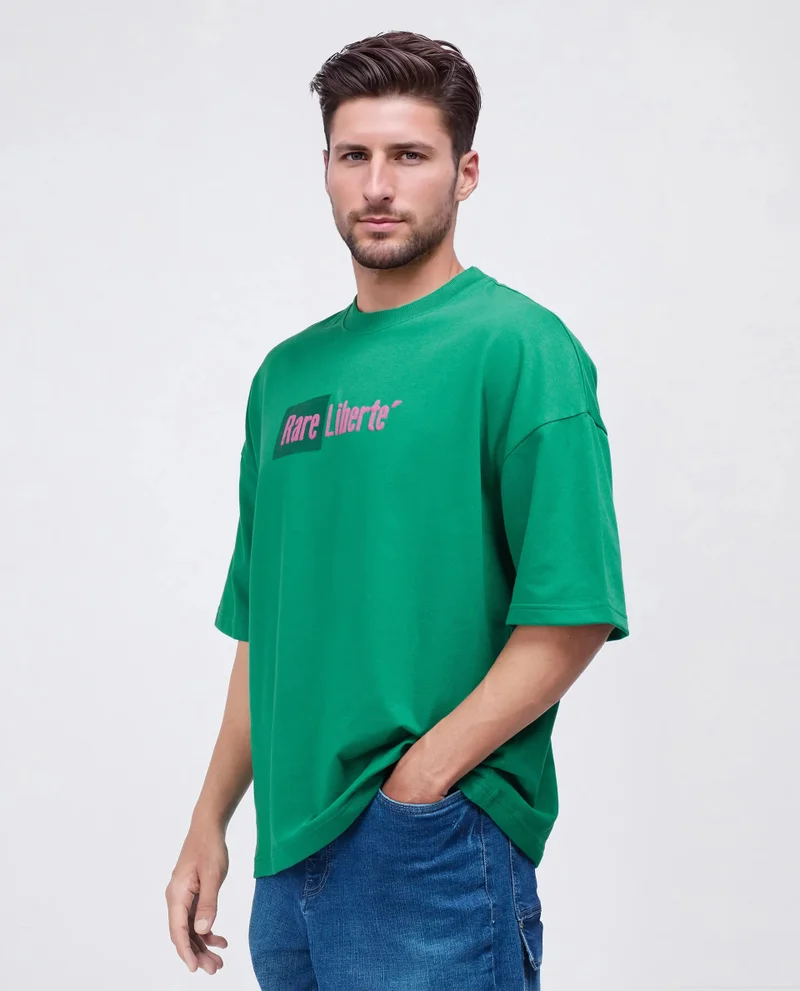 Rare Rabbit Rare Rabbit Men Moshe Green Cotton Fabric Short Sleeve Oversized Fit Graphic Printed T-Shirt