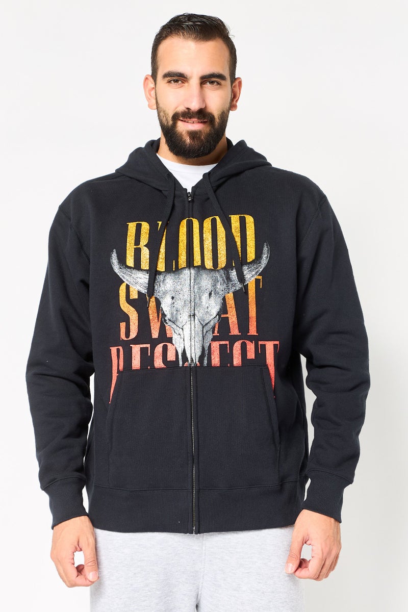 UNDER ARMOUR سويت شيرت خارجي بأكمام طويلة فضفاضة للرجال من أندر أرمور × مشروع روك، أسود - Image 1