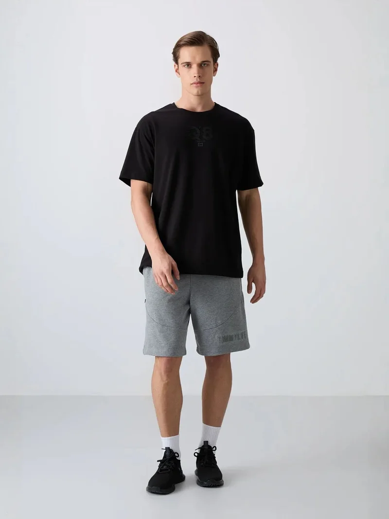 تومي لايف TOMMY Oversized Printed Logo Crew Neck T-Shirt