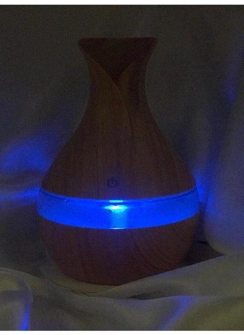 Essential oil diffuser to purify, fragrance and disinfect the air using natural essential oils with variable lighting