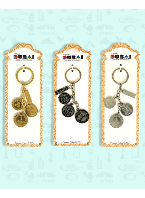 Premium UAE Coin Replica Metal Keychain set (3 pcs) featuring iconic UAE currency designs. A perfect Dubai/UAE souvenir, travel gift, and everyday accessory.